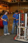 Matt (left) and Larry (right) testing robot at competition
